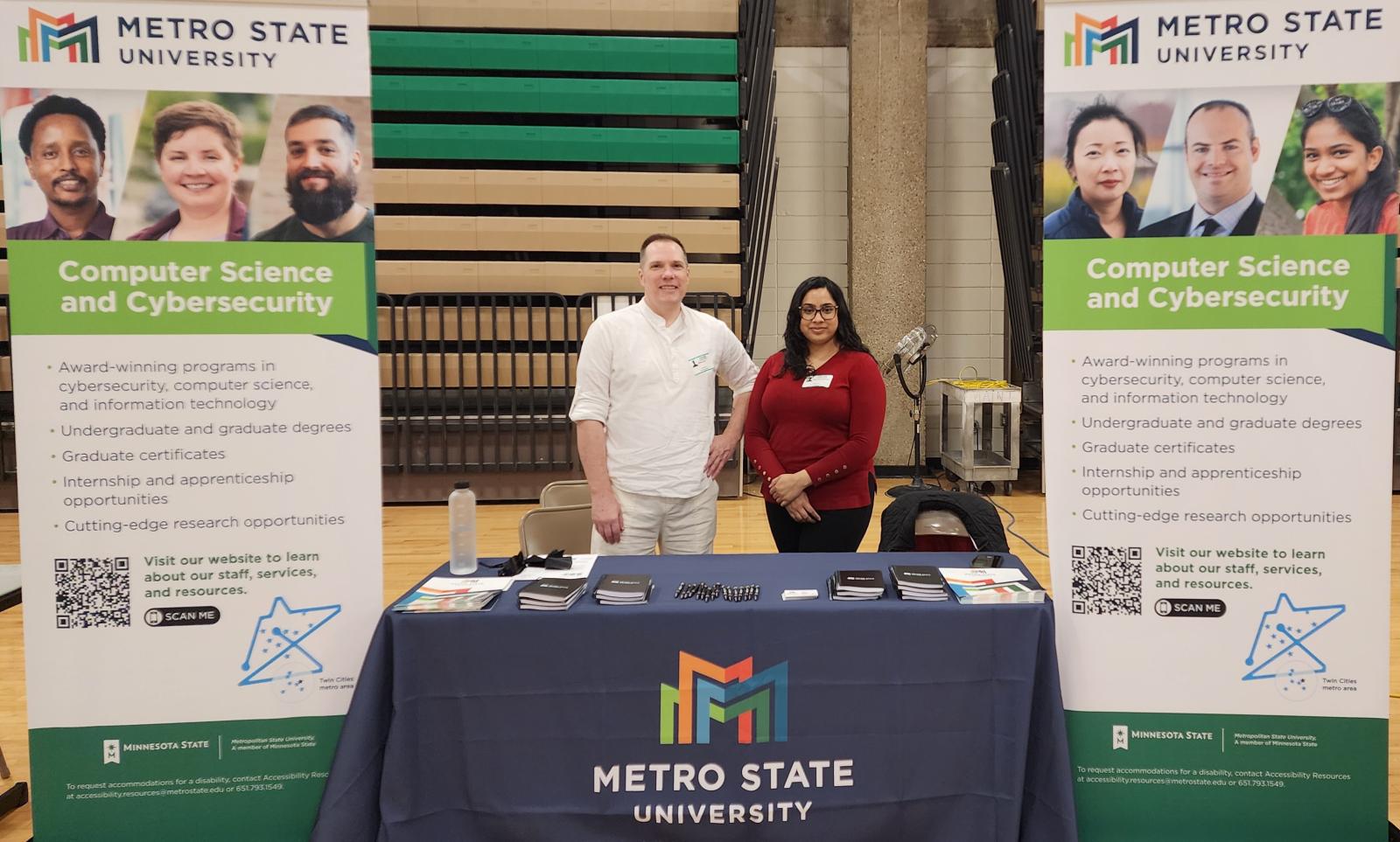Metro State Cyber Clinic table at the Edina High School job fair