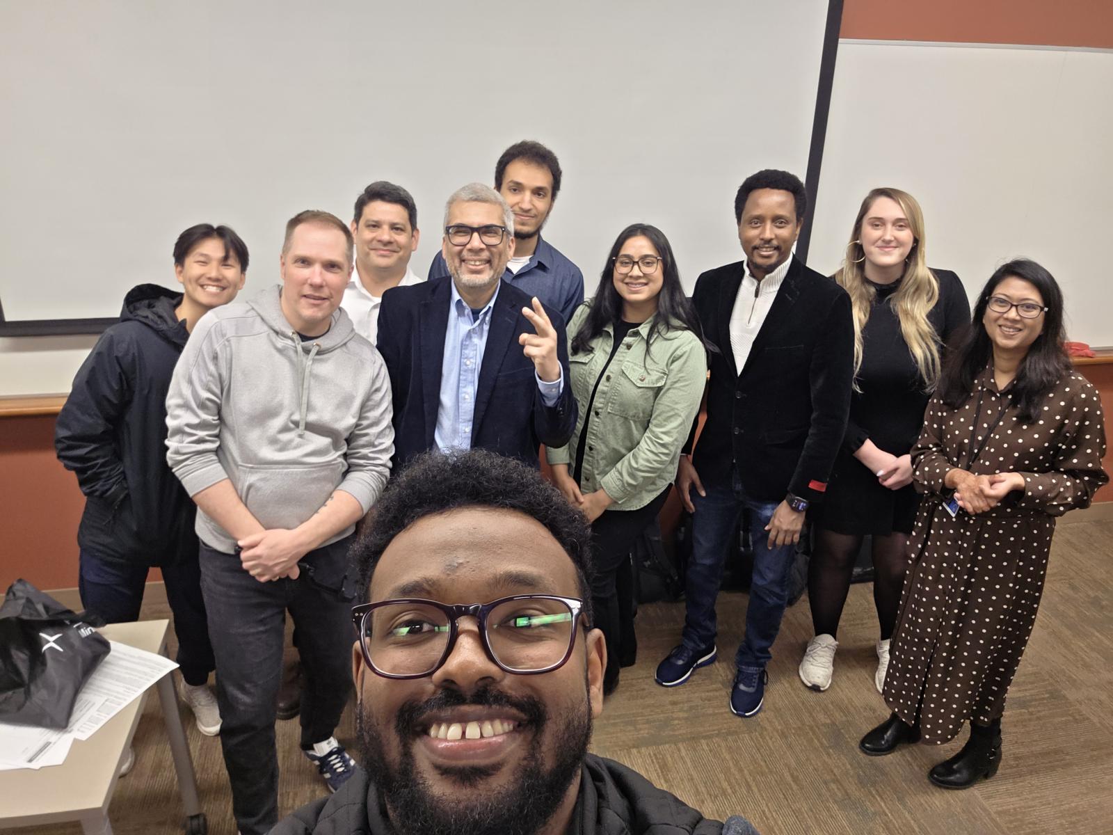 A group of people pose for a picture