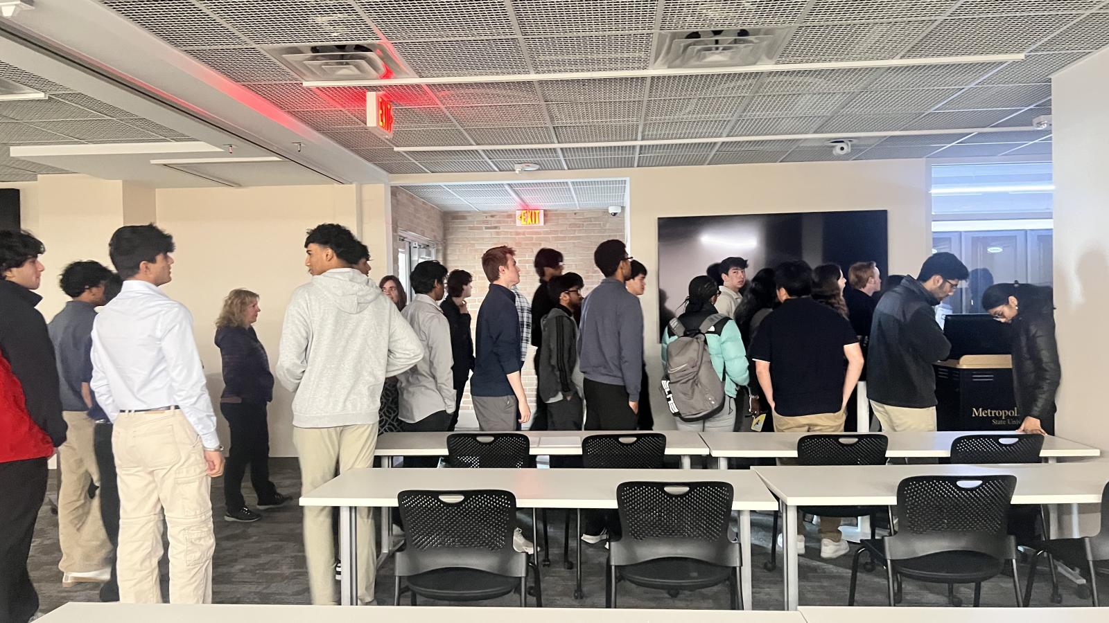 a group of students on a tour of Metro Cyber Center
